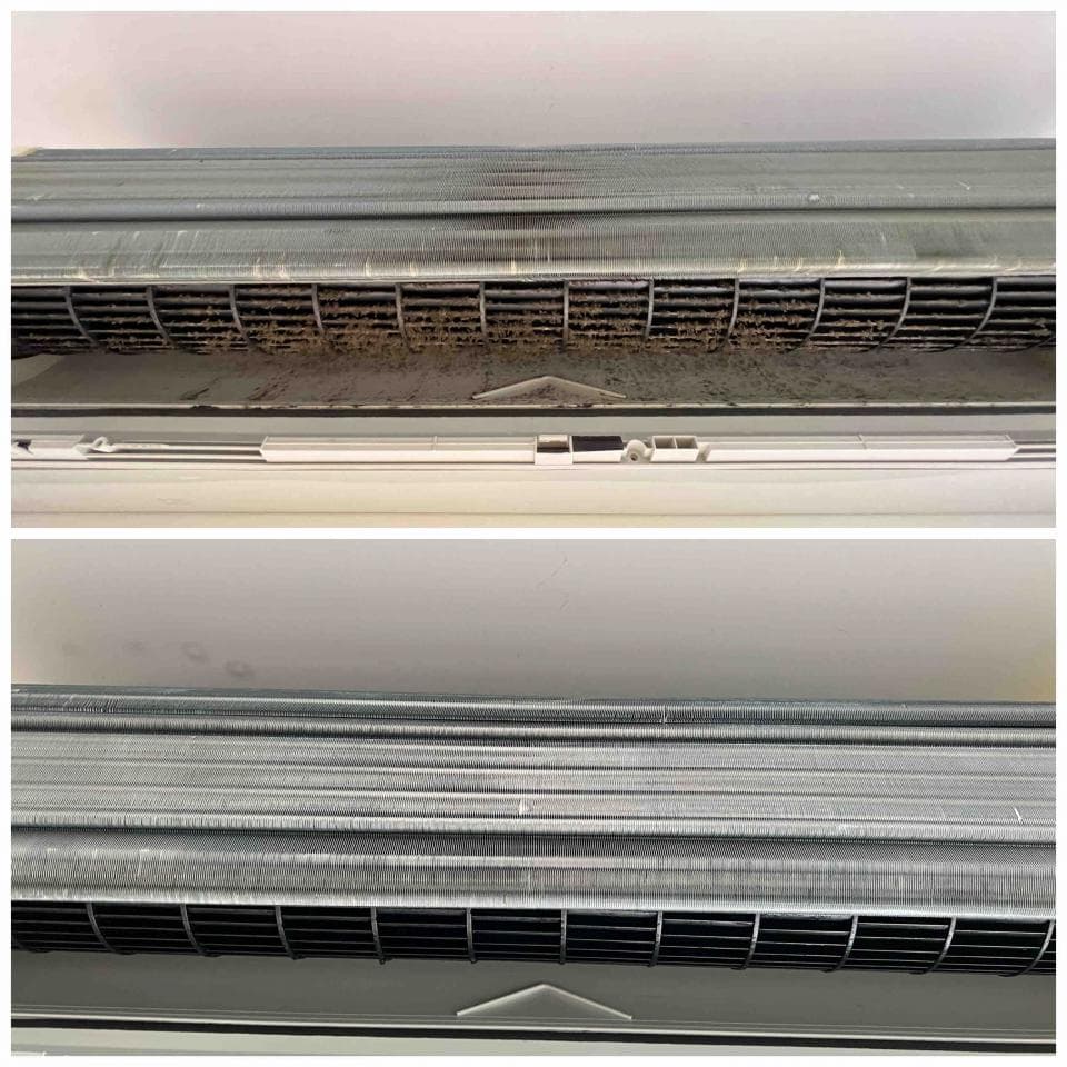 1) 照片顯示一個髒的空調,上面佈滿灰塵